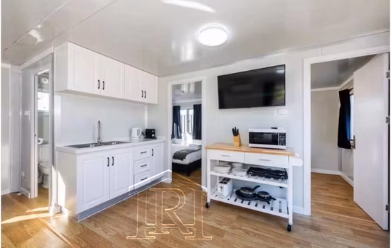 Maison préfabriquée Mobile portative de 20 pieds 40 pieds, bâtiment modulaire préfabriqué en acier, maison de conteneur pliable et extensible à vendre